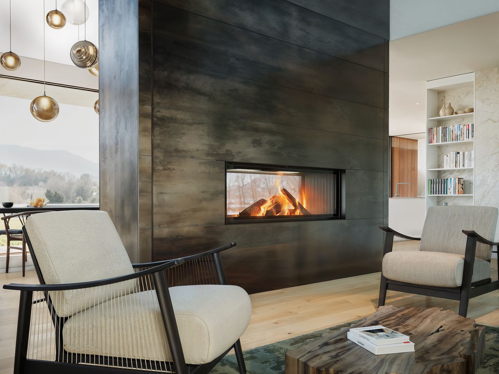 Tunnelkamin mit großer Sichtscheibe als Raumteiler