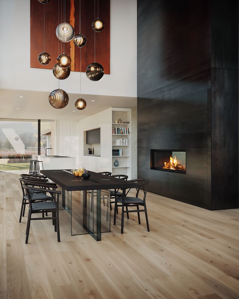 Tunnelkamin mit Rohstahlverkleidung als deckenhoher Raumteiler hinter dem Essbereich