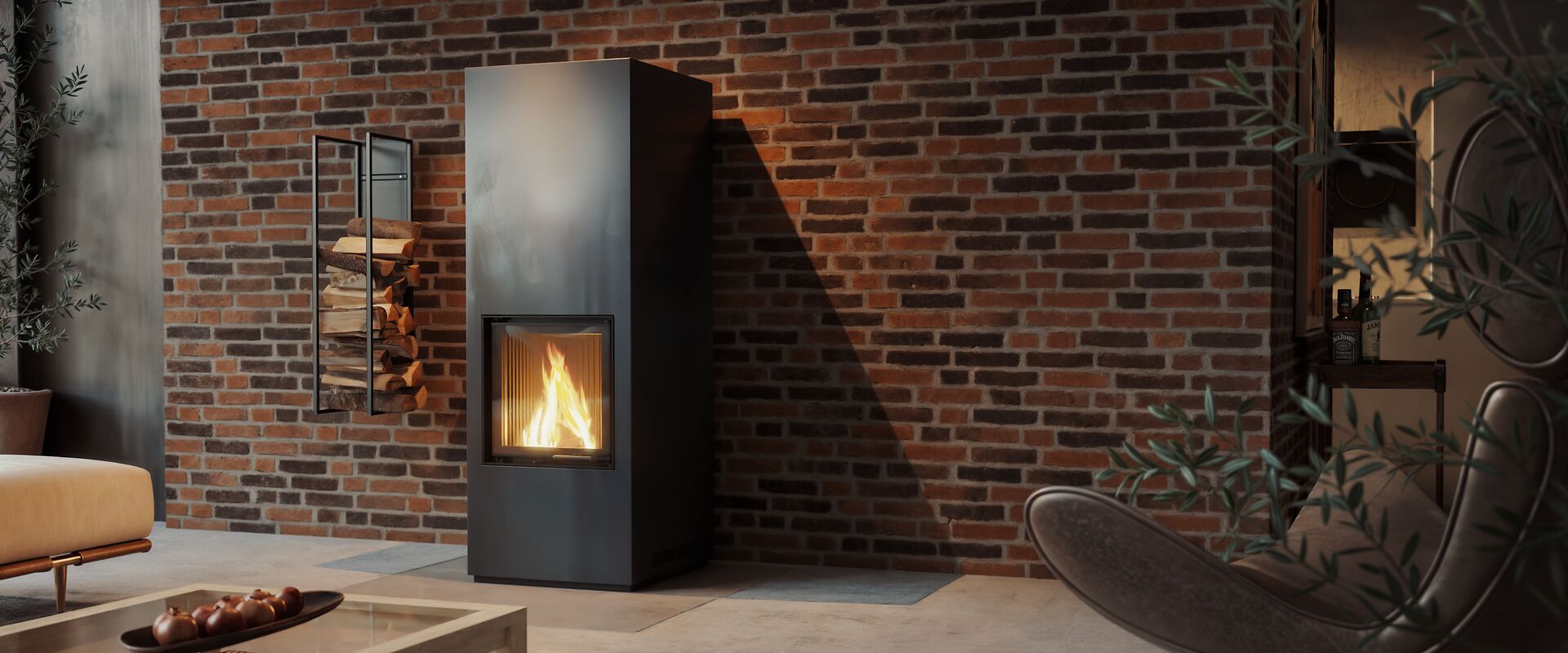 Free standing stove with raw steel cladding in front of a stone wall